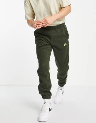 Nike Sportswear Sport Essentials cuffed polar fleece joggers in khaki  - ASOS Price Checker