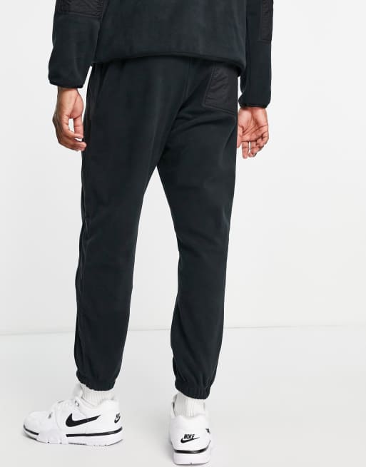 Nike - Sportswear Sport Essentials - Joggers in pile termico con fondo elasticizzato, colore nero, 2 di 4