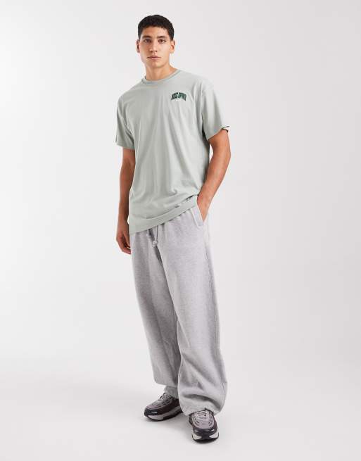 Nike - Sportswear - T-shirt verde chiaro con grafica stampata sul retro, 2 di 5