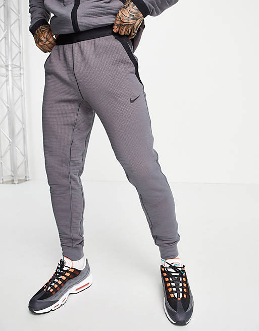 Nike Sportswear tech pack joggers in grey | ASOS