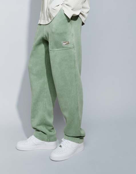 Nike spray graphic open hem joggers in washed khaki - view 1