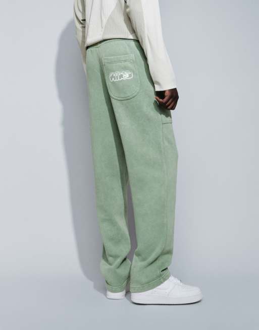 Nike spray graphic open hem joggers in washed khaki, 4 of 9
