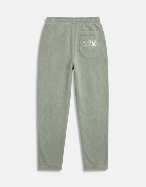 Nike spray graphic open hem joggers in washed khaki, 7 of 9