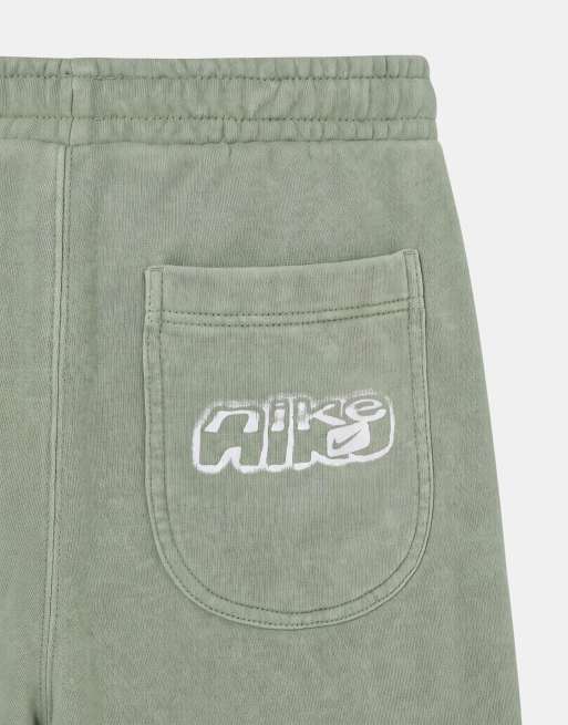 Nike spray graphic open hem joggers in washed khaki, 9 of 9