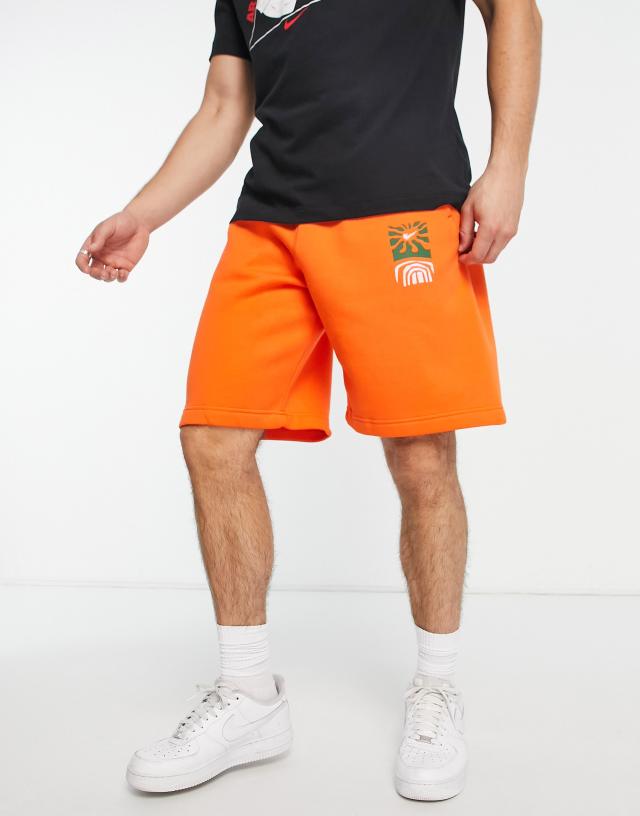 Nike Spring Break graphic logo shorts in orange