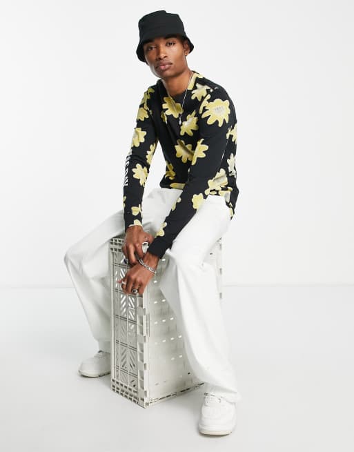 Nike Statement floral print long sleeve t-shirt in black | ASOS