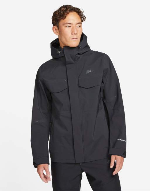 Nike StormFIT ADV M65 shell hooded jacket in black | ASOS