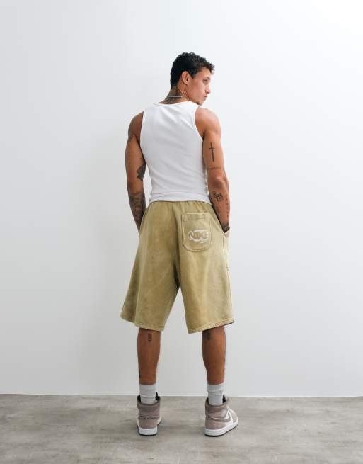 Nike Street jersey logo back pocket shorts in beige, 3 of 5