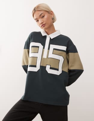 Nike - Street - Langärmliges Polohemd in Grün und Beige mit Grafik-Grau