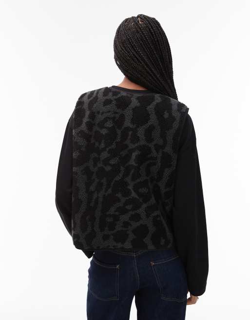 Nike Street reversible sherpa vest in black and leopard print, 2 of 4