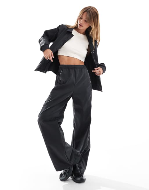 Nike Streetwear – Czarne spodnie z tkaniny