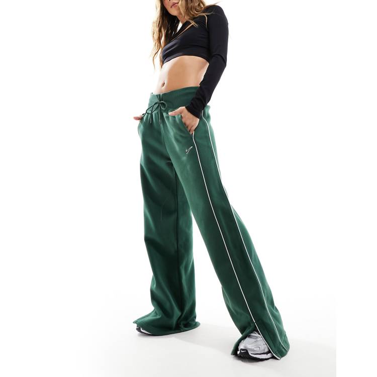 Green Flare Nike Sweatpants, only worn a couple of - Depop