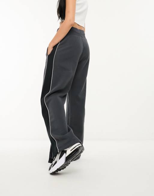 Nike Streetwear Oversized joggingbroek van fleece met wijde pijpen in donkergrijs ASOS