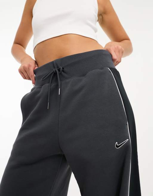 Nike - Pantalon de jogging large taille haute avec petit logo virgule - Noir  et voile