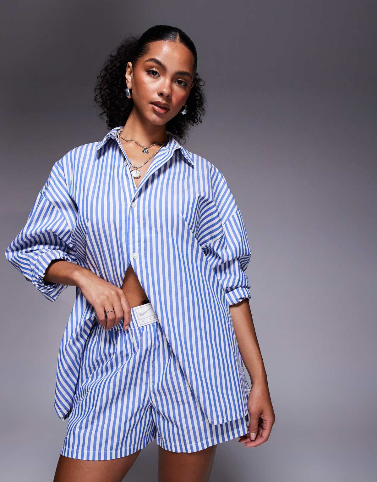 Nike Stripe poplin shorts in blue and white