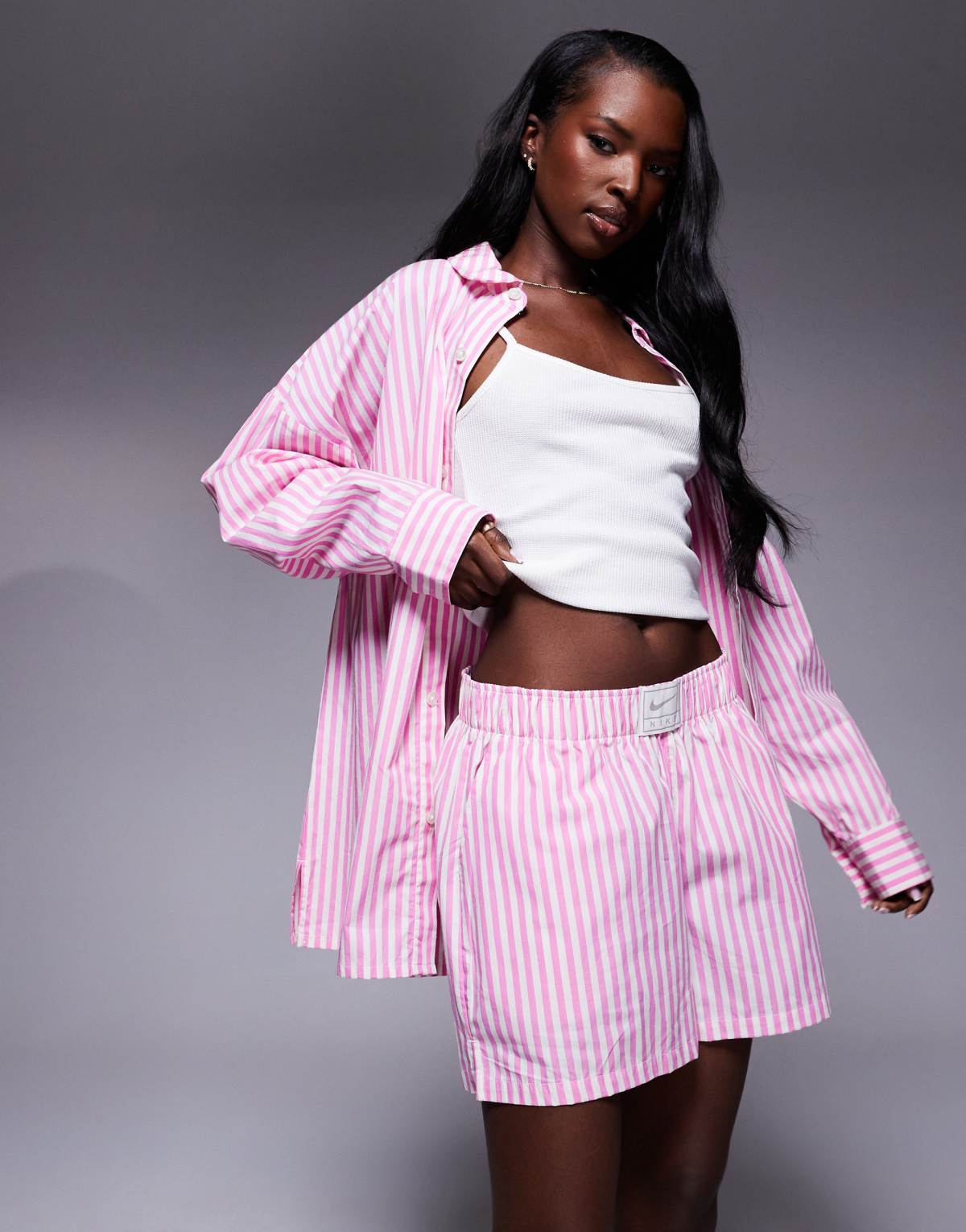 Nike Stripe poplin shorts in pink and white