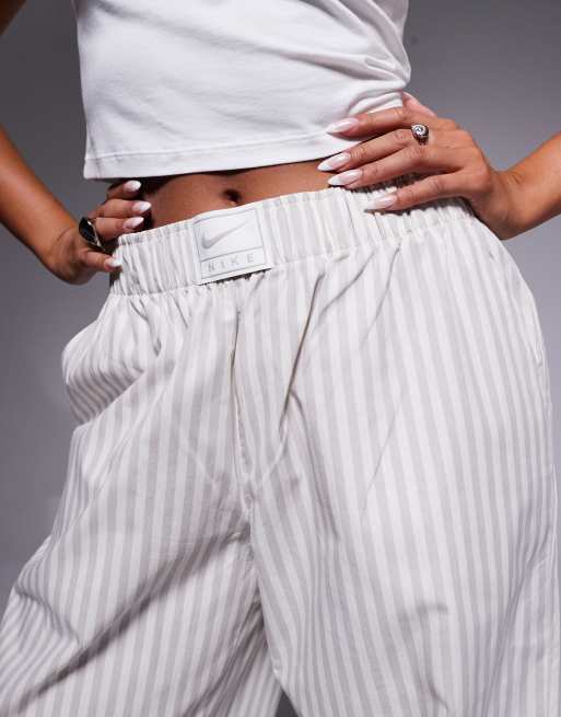 Nike striped poplin pants in light gray | ASOS