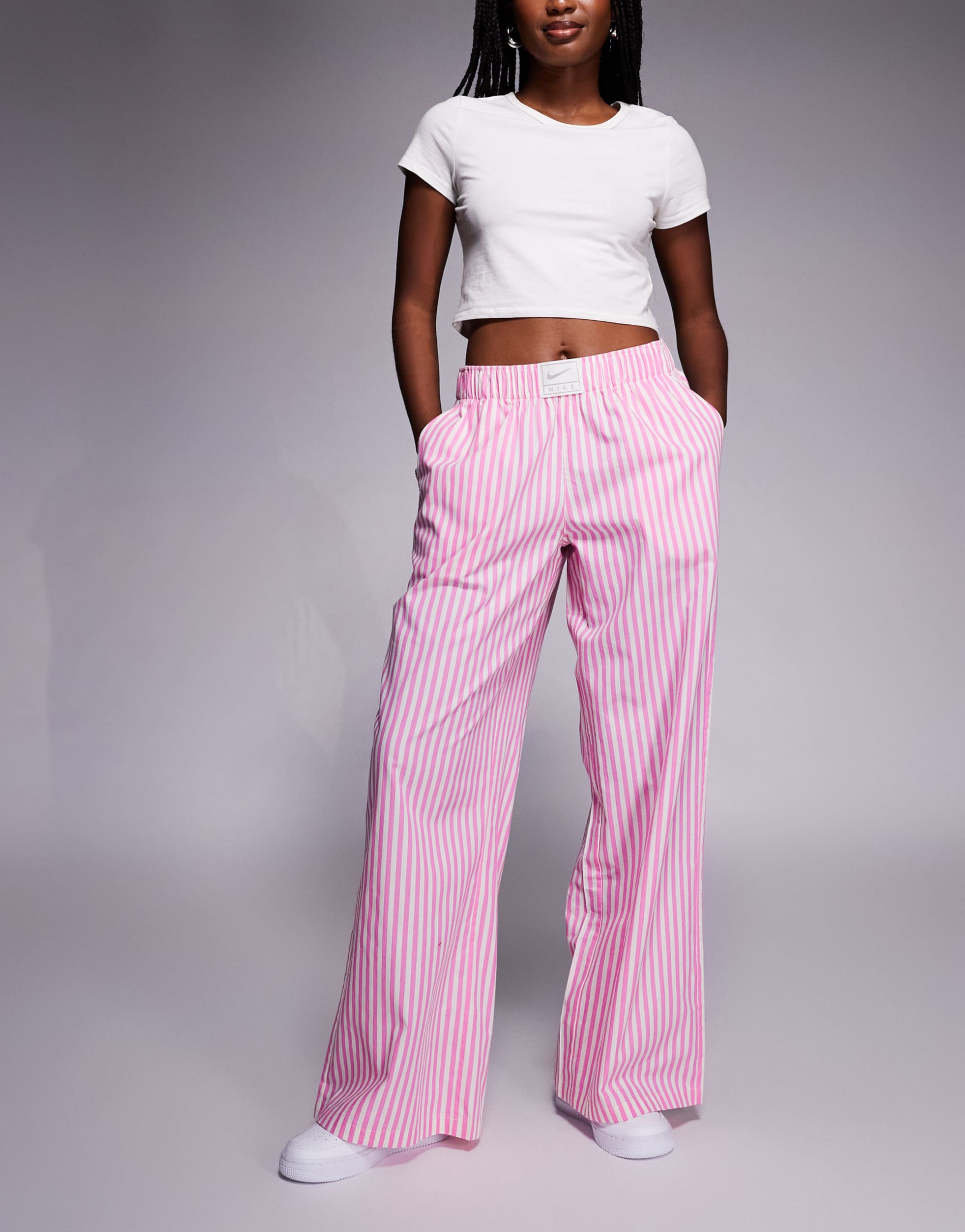 nike striped poplin pants in pink