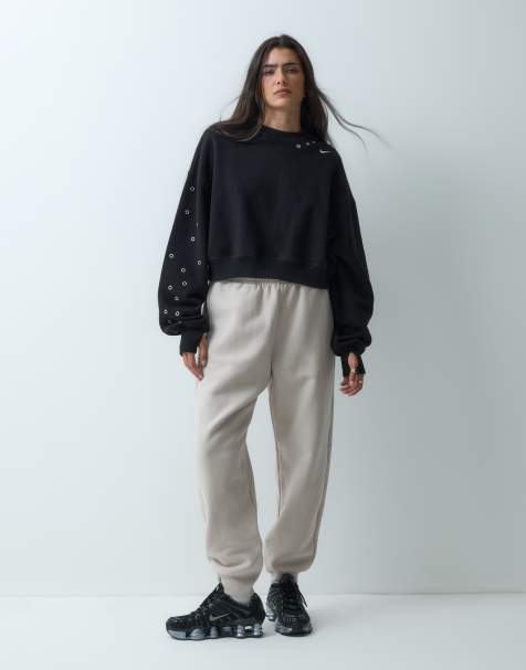 Nike Studio Fleece cuffed sweatpants in cream - view 1