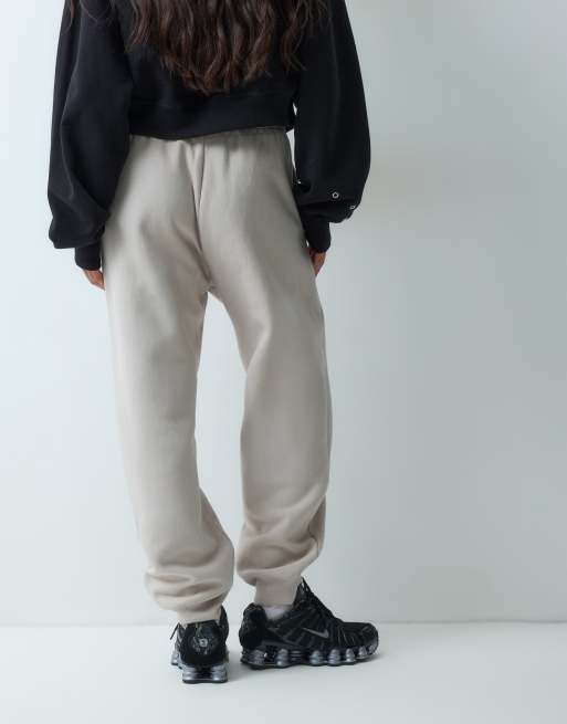 Nike Studio Fleece cuffed sweatpants in cream, 5 of 5