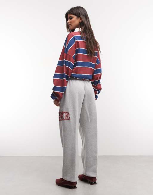 Nike Studio Fleece mid-weight varsity graphic oversized joggers in grey, 4 of 5