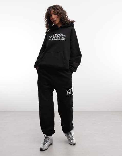 Nike Studio - Joggers oversize in pile di media pesantezza neri con logo - view 1