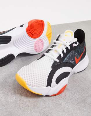 nike orange and black trainers