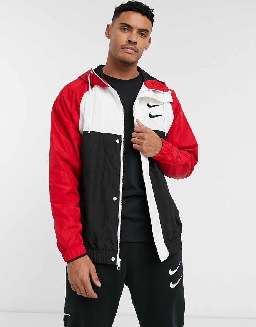 Nike – Svart och röd blockfärgad jacka i vävt material med huva, Swoosh-logga och dragkedja