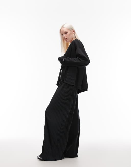 Nike – Svarta, plisserade byxor med vida ben, 4 av 5