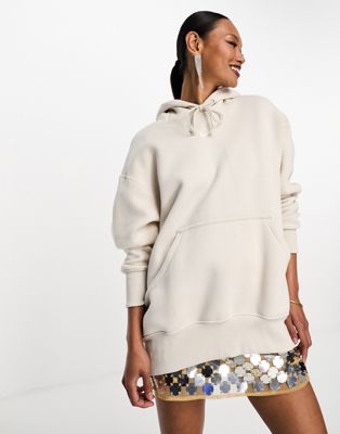 Nike mini swoosh oversized fleece hoodie in light orewood brown - ASOS Price Checker