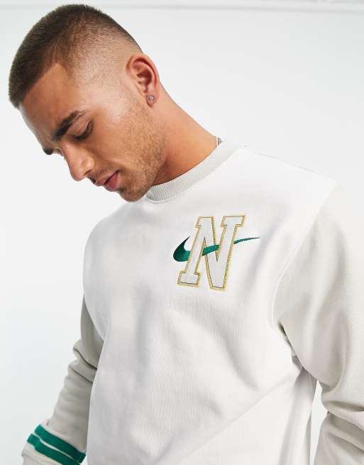 Sweat nike best sale plein de logo