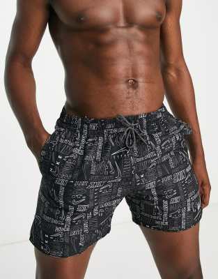 5 inch all over logo print swim shorts in black