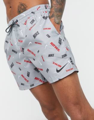 nike swimming 5inch volley shorts with all over swoosh print in black