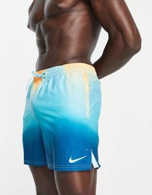 Explore 5 inch tie dye swim shorts in orange and blue