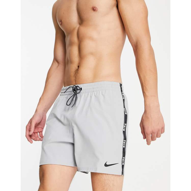 Nike air logo tape shorts in white, ASOS