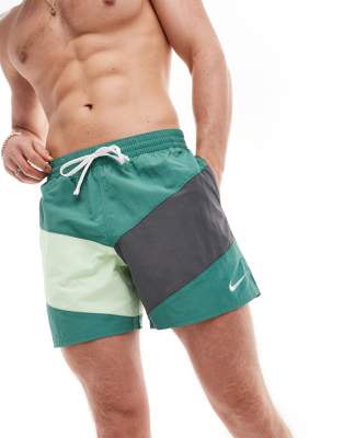 Nike Swimming Nike Swimming Multi Logo Vortex 5 inch volley colourblock swim shorts in bicoastal green