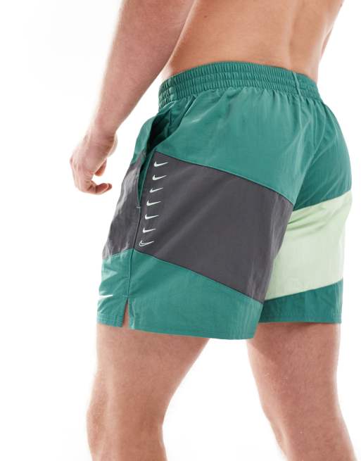 Nike Swimming Multi Logo Vortex 5 inch volley colourblock swim shorts in bicoastal green