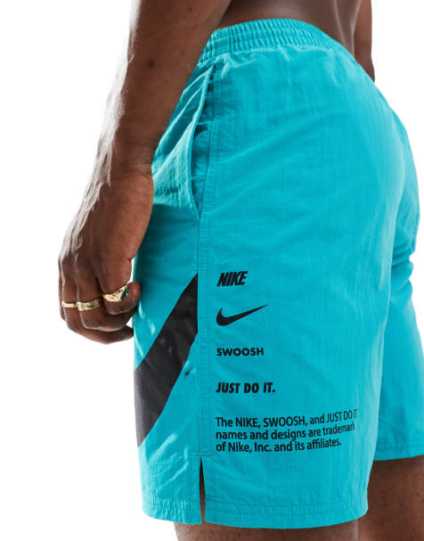 Nike Swimming Specs 7 inch volley large swoosh swim shorts in teal - view 1