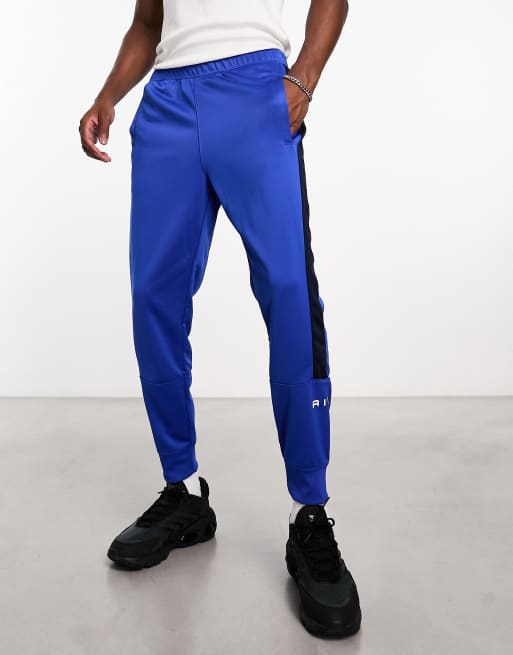 Nike Swoosh Air joggers in blue ASOS