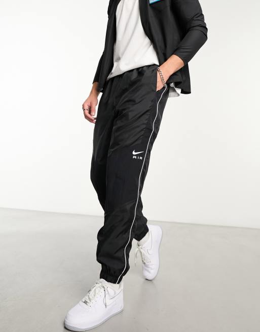 Nike swoosh best sale cuff track pants