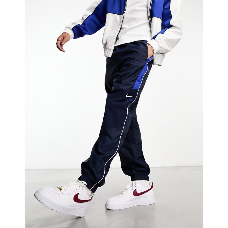 Nike swoosh woven hot sale track pants