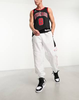 nike swoosh joggers black and white