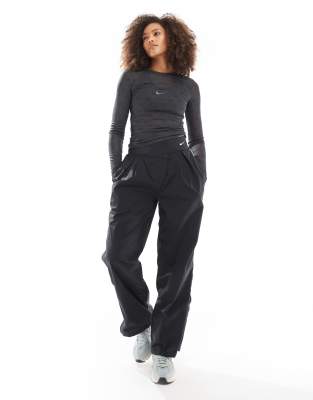 Nike Swoosh asymetric trousers in black