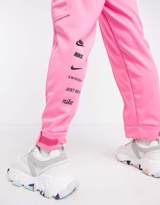 Nike swoosh cargo pocket joggers in pink