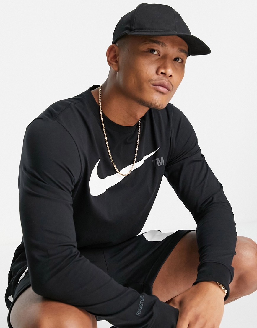 Nike Swoosh chest logo long sleeve t-shirt in black