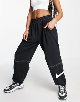 Nike Swoosh contrast stitch fleece joggers in black