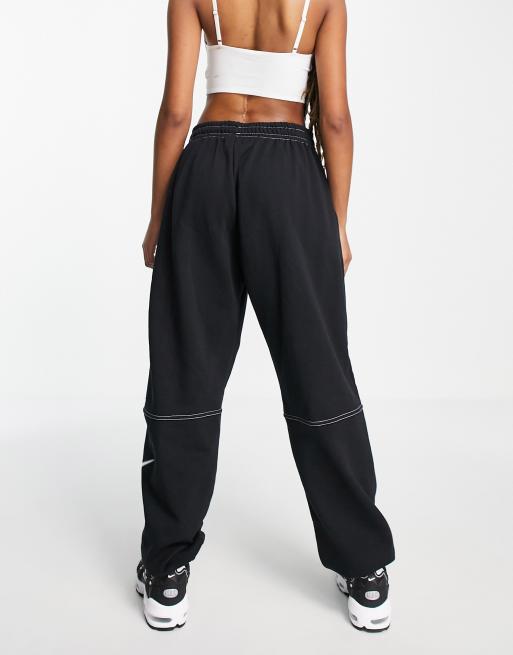 Nike black swoosh joggers hot sale