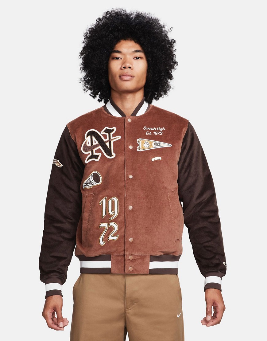 Swoosh corduroy bomber jacket in brown