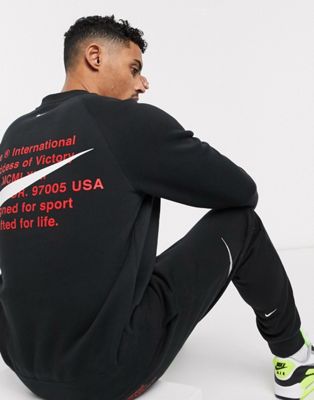 Nike Swoosh crew neck sweat in black | ASOS