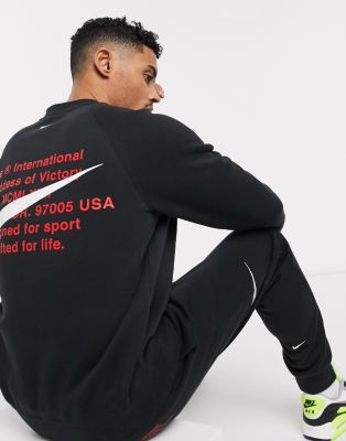 Nike Swoosh crew neck sweat in black | ASOS